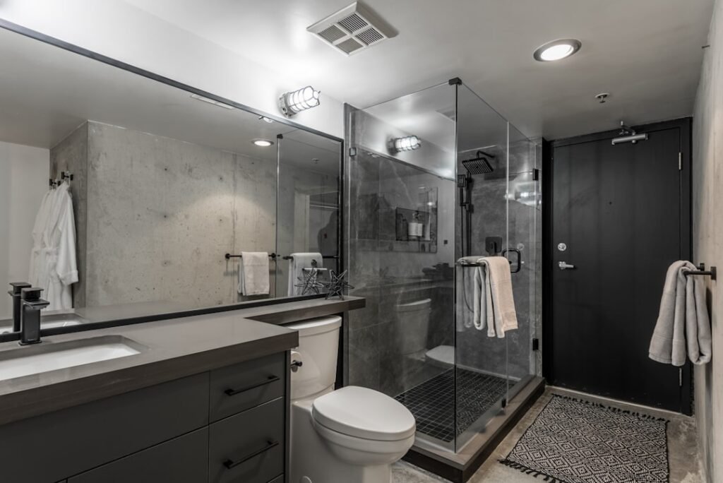 Remodeled bathroom with tiled walk-in shower
