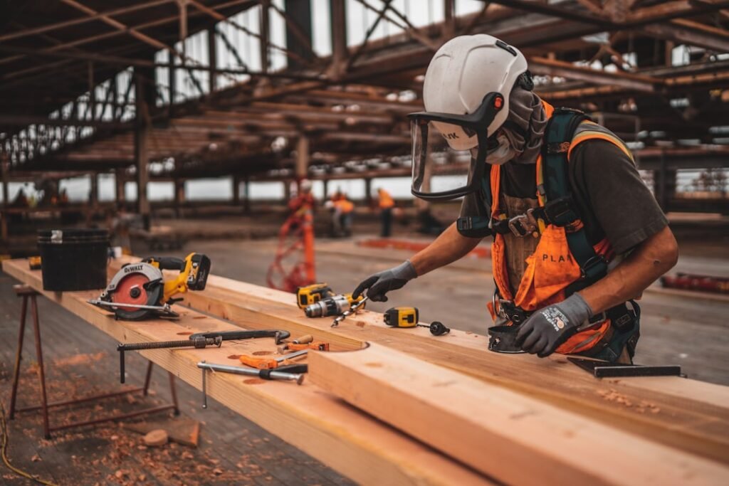 Eming Construction crew member working on site